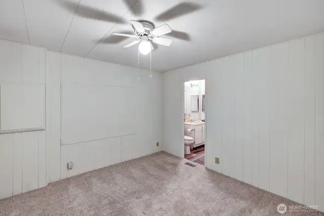 Guest bedroom with adjoining full guest bathroom or office, sewing room. You decide.