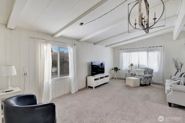 Side window also lets in natural light all day. Plantation blinds and sheers on all the vinyl windows. New carpet with an upgraded pad for your comfort.