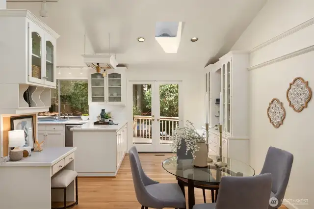 French doors open to decks for al fresco dining.