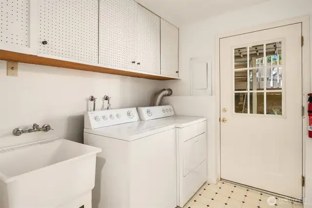 Large laundry with sink.