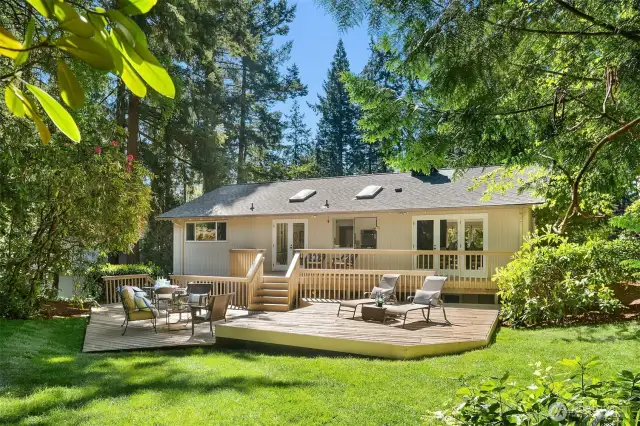 Beautiful home from all sides.Look at those decks and lawn.