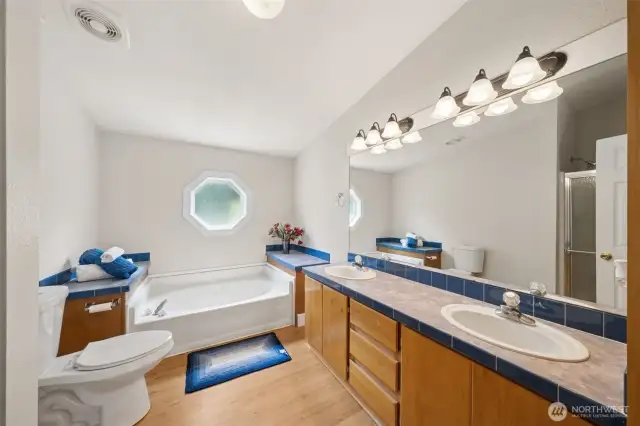 Your wonderful Primary Bath offers dual sinks, a lovely soaking tub and a separate shower!