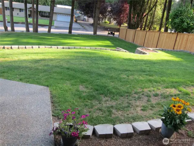 Emerald lawns (from the front door looking out, driveway to the left of the walkway)