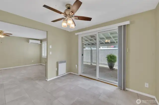 Dining room off kitchen with slider to covered patio.