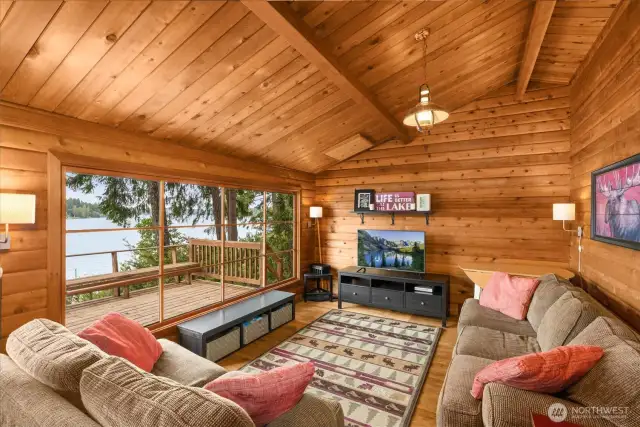 Oversized picture window frames sweeping panaromaic views of the lake right from your living room.