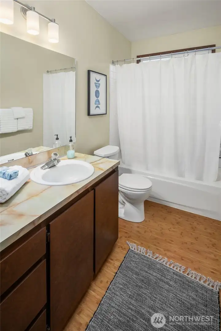 Lower level bathroom can be used as an en-suite bedroom/bath.