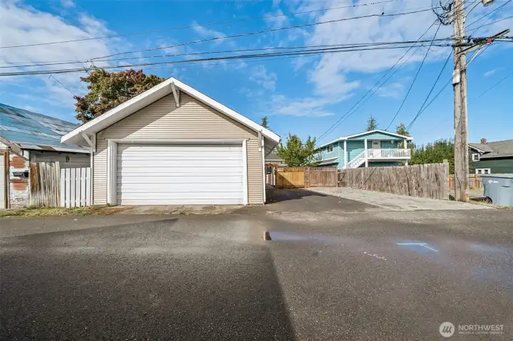 Enjoy the convenience of a spacious 2-car garage with extra parking and alley access—offering plenty of room for vehicles, toys, or projects.