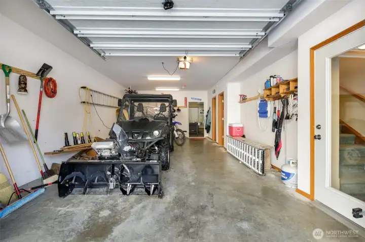Finished and heated garage for all season's activities and storage.