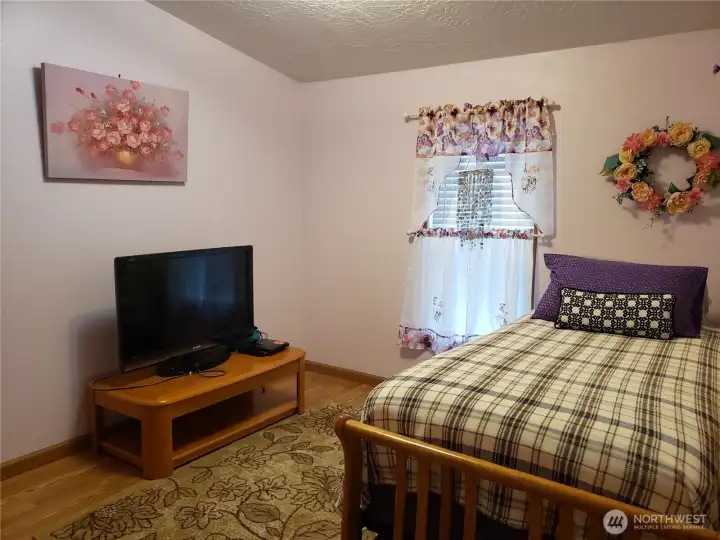 Good Size Second Bedroom with Laminate Flooring.