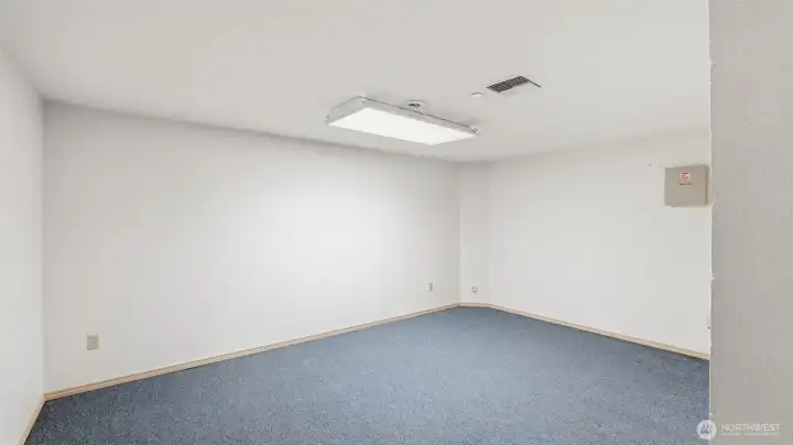 A versatile room ready to become your personal media space or retreat.