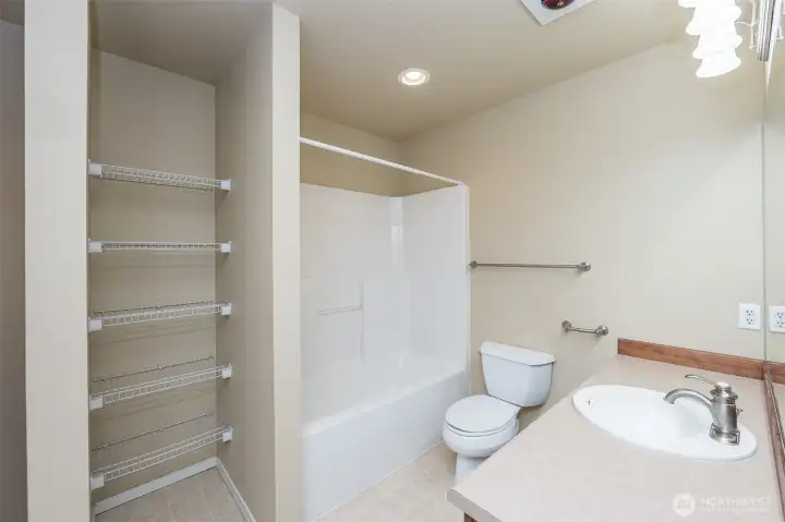 3rd floor guest bathroom and shared laundry room