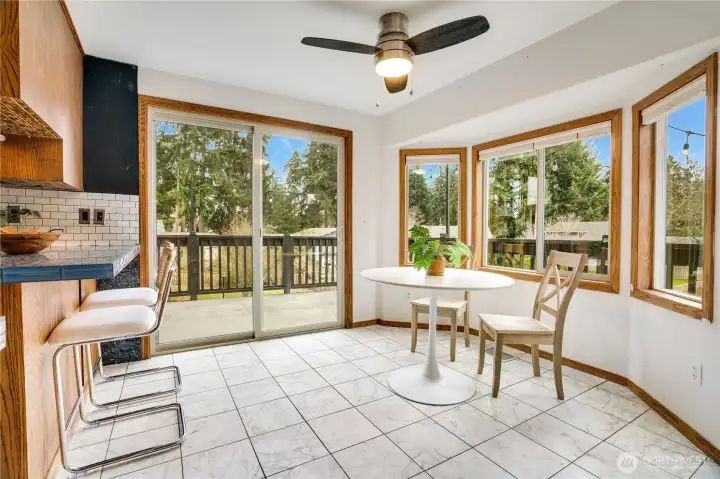 These large sliders bring in the light and give access to your wrap around deck, perfect for quiet mornings, outdoor herbs and garden, and seasonal BBQ's.