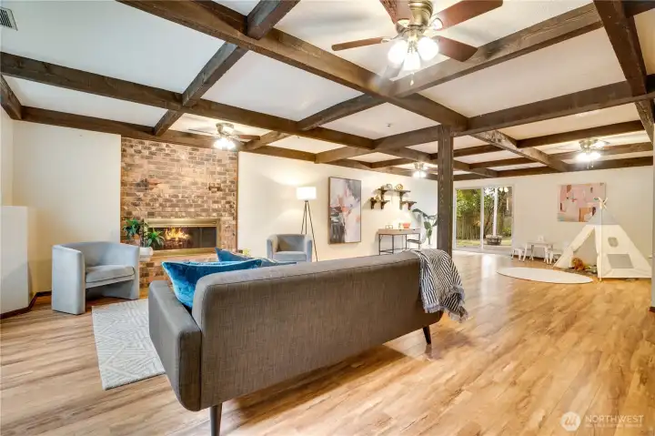 This downstairs recreation has a fireplace, storage closet and slider access to the back yards.  From media, to gym, to office, to playspace - you can fit it all in this wonderful room!