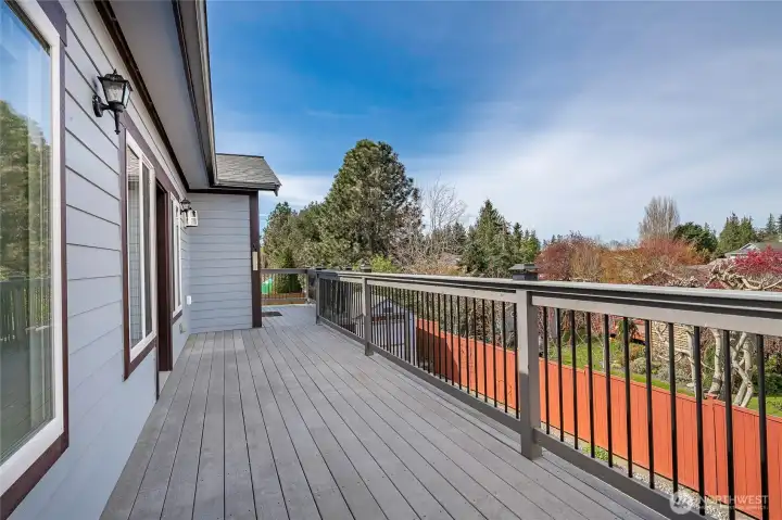 Deck on west side of home.  Door off the Living/Dining rooms.