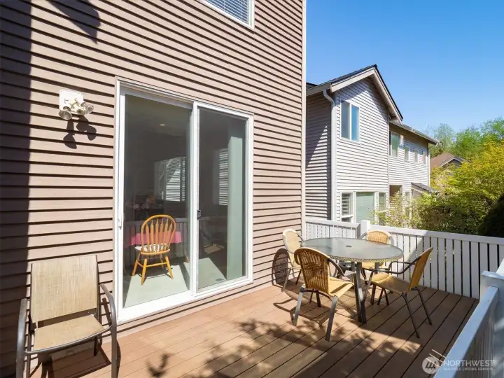 Azek brand deck replacing the original cedar—perfect for relaxing or entertaining year-round.