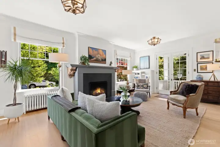 Natural light pours through expansive, mullioned windows, gracing each room. Natural light pours through expansive, mullioned windows, gracing each room.
