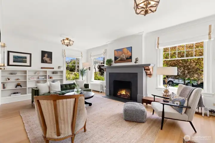 Massive custom slate fireplace with incredible salvaged corbles punctuate the living room with a chic and authentic vibe. Massive custom slate fireplace with incredible salvaged corbles punctuate the living room with a chic and authentic vibe.