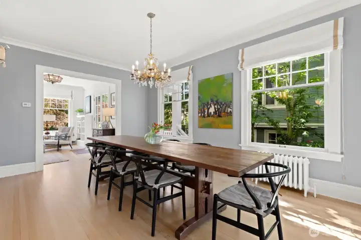 Large scale formal dining is set just off of the kitchen and enjoys a leafy outlook. Large scale formal dining is set just off of the kitchen and enjoys a leafy outlook.
