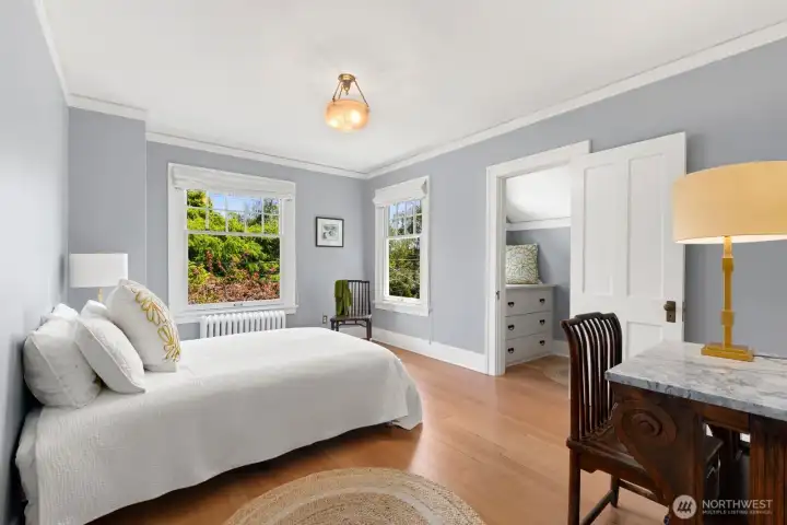 Sunlight streams into second well-proportioned corner bedroom with walk-in closet. Sunlight streams into second well-proportioned corner bedroom with walk-in closet.
