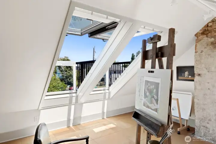 These unique skylights open to create a balcony feel. These unique skylights open to create a balcony feel.
