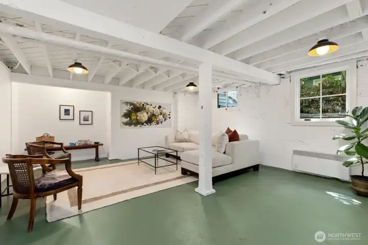 The lower level is freshly painted including the floor and has new lighting. Large scale it can serve as a gathering area for games, t.v./movie viewing or re-imagined partly into guest quarters with a separate entrance. There are also abundant storage possibilities with built-in shelving and a mechanical room. The lower level is freshly painted including the floor and has new lighting. Large scale it can serve as a gathering area for games, t.v./movie viewing or re-imagined partly into guest quarters with a separate entrance. There are also abundant storage possibilities with built-in shelving and a mechanical room.