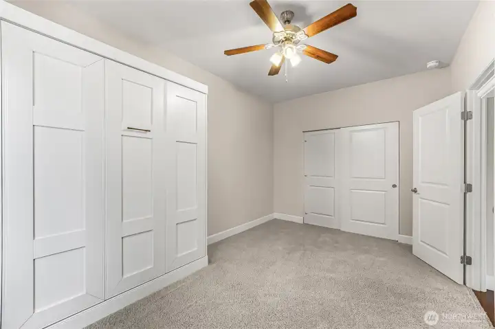 Main floor bedroom with custom queen-size Murphy bed. Main floor bedroom with custom queen-size Murphy bed.