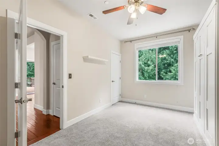 Another view of the main floor bedroom next to 3/4 bath