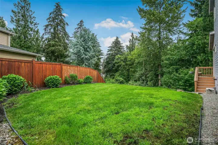 Relax or play in the large side yard. Fenced.