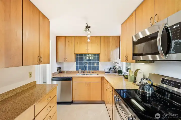 Clean, functional kitchen with great prep space and natural light
