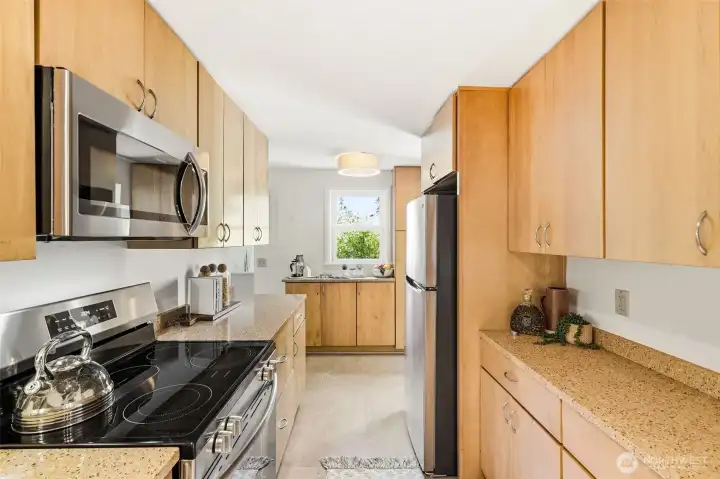 Freshly updated kitchen with a layout that connects nicely to the dining area