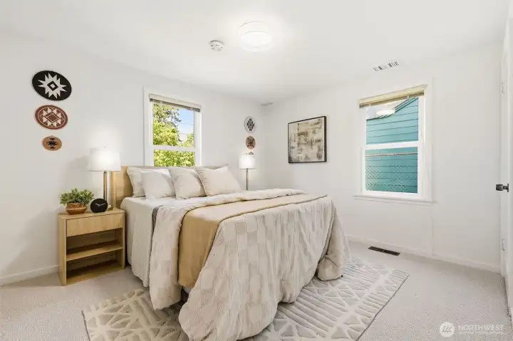 Main floor bedroom filled with natural light