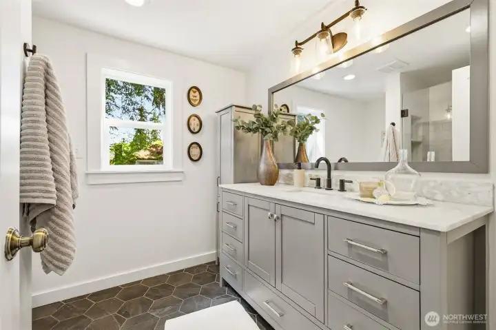 Updated bathroom with generous vanity space and a clean, fresh feel