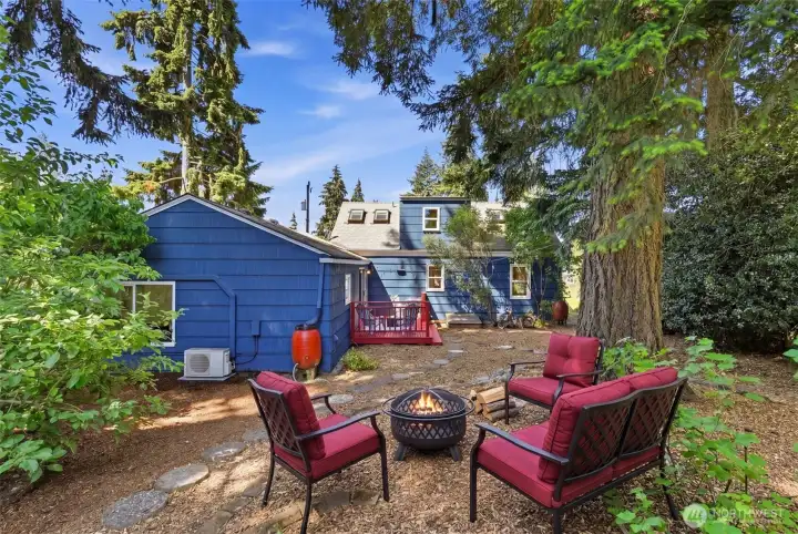 Mature landscaping creates a peaceful and secluded backyard setting