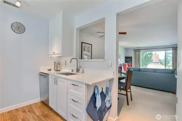 Kitchen open to dining and living rooms. Kitchen open to dining and living rooms.