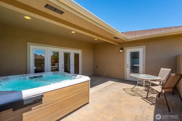 The Hot Tub tucked into a private courtyard just outside of the Living Room.