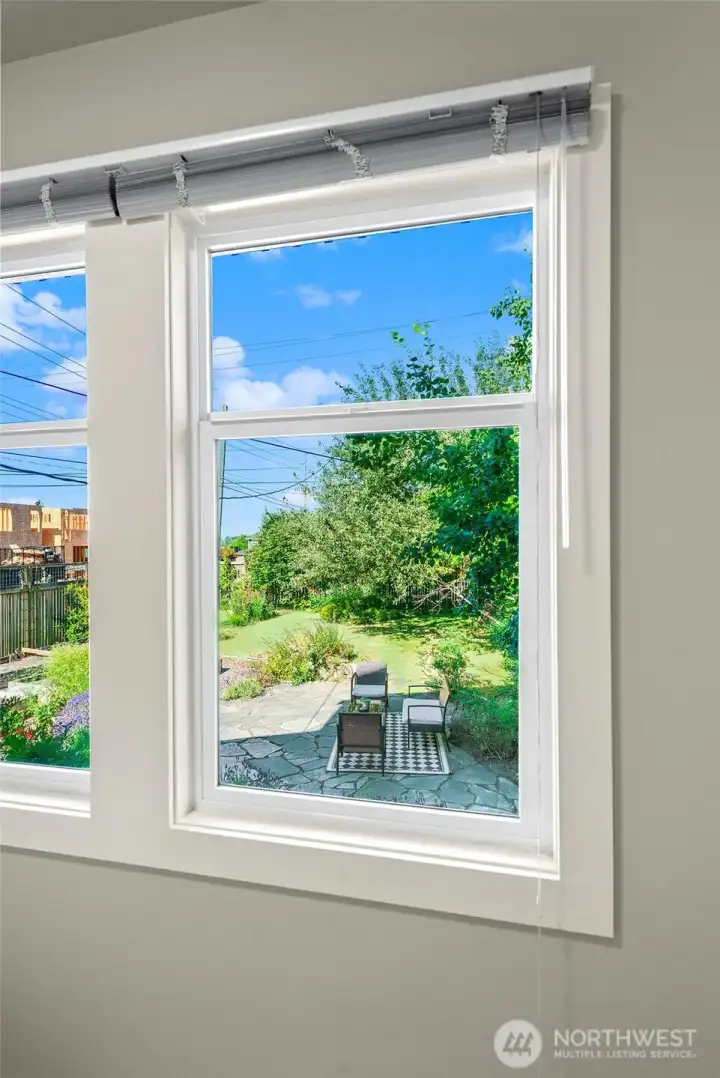 Main floor BR overlooks the lush backyard Main floor BR overlooks the lush backyard