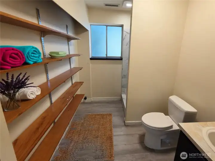 The bathroom is on the lower level.