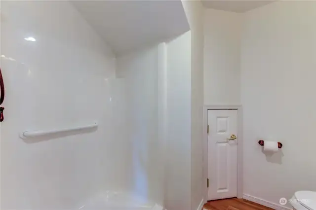 Extra wide shower in the 3/4 bath and a small storage closet is present.
