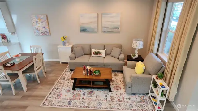 Cozy Living room with LVP flooring for easy maintenance.