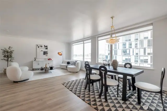Spacious living room w/ wall of windows
