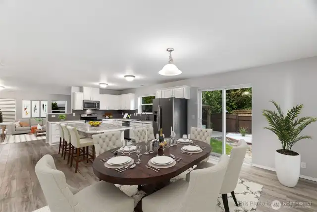 There is room for a large dining table in the dining room, plus barstools for casual dining at the island. Convenient slider to rear patio and yard for easy entertaining.