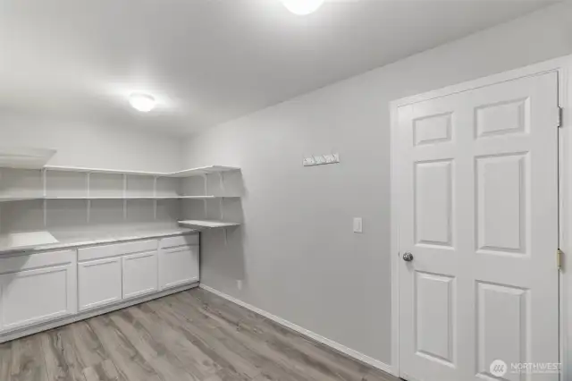 Wow! What a pantry. This alone is a reason to buy this house! Door leads to garage and there is plenty of space here for a mudroom.
