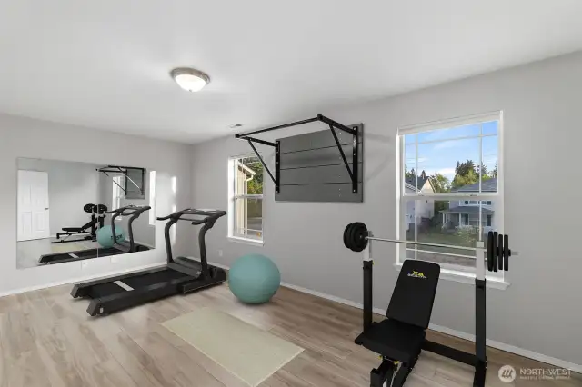 Upstairs is a large bonus room, in addition to four bedrooms. The owners used it as a work out room.