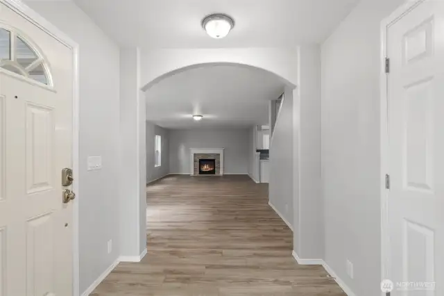 Spacious entry. Inside this coat closet is a brilliant hanging organization system for coats and more.