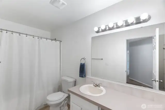 Spacious shared bath with plenty of counter space