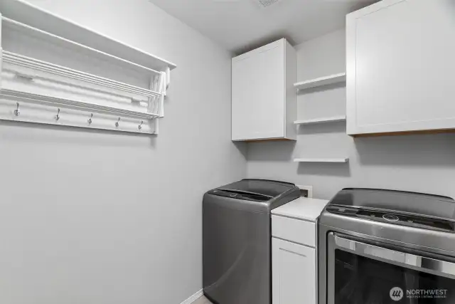 The laundry room is conveniently located upstairs, where the dirty clothes are!