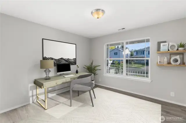 Not only does this home feature four bedrooms PLUS a bonus room....it also has a main floor office!  Virtually staged home office gets great light, and has views to the front of the home