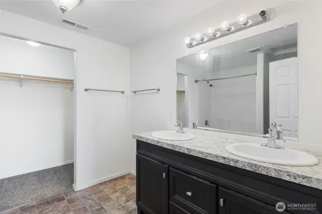 Primary bathroom with walk-in closet