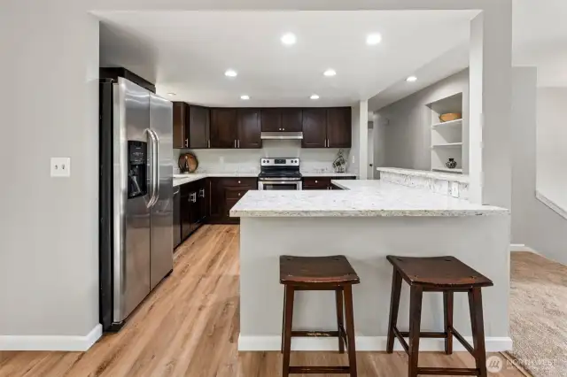 Updated kitchen with quartz countertops.