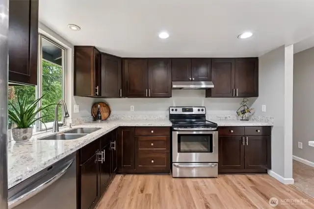 Updated kitchen with ample cabinetry.